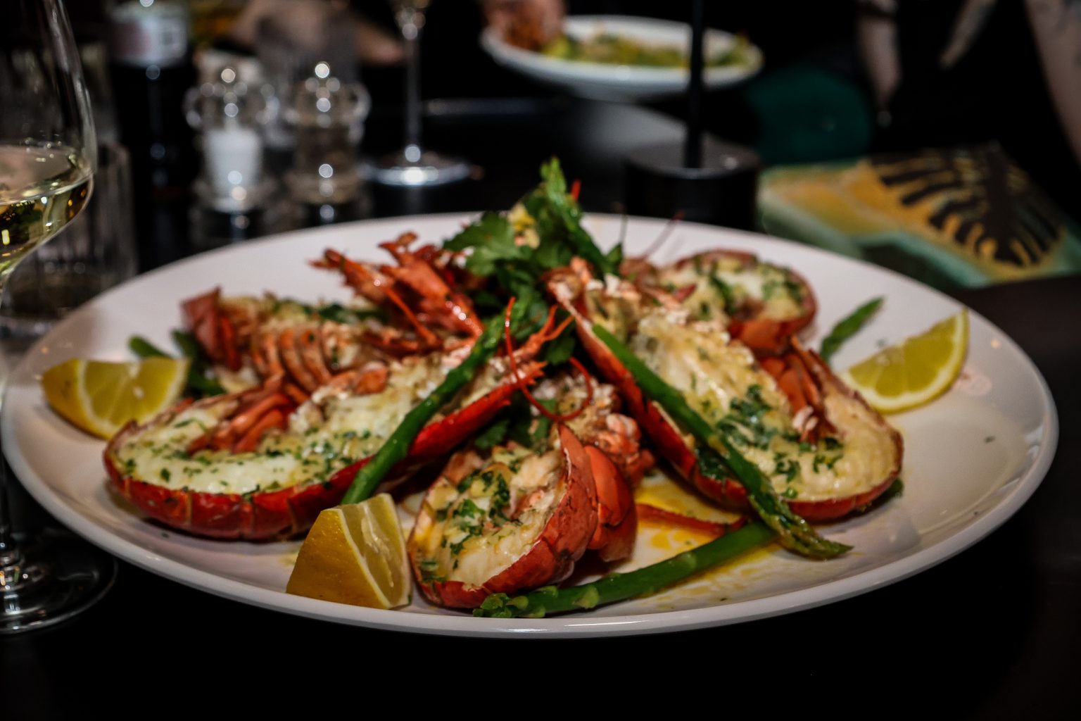 Grilled lobster platter with lemon and herbs